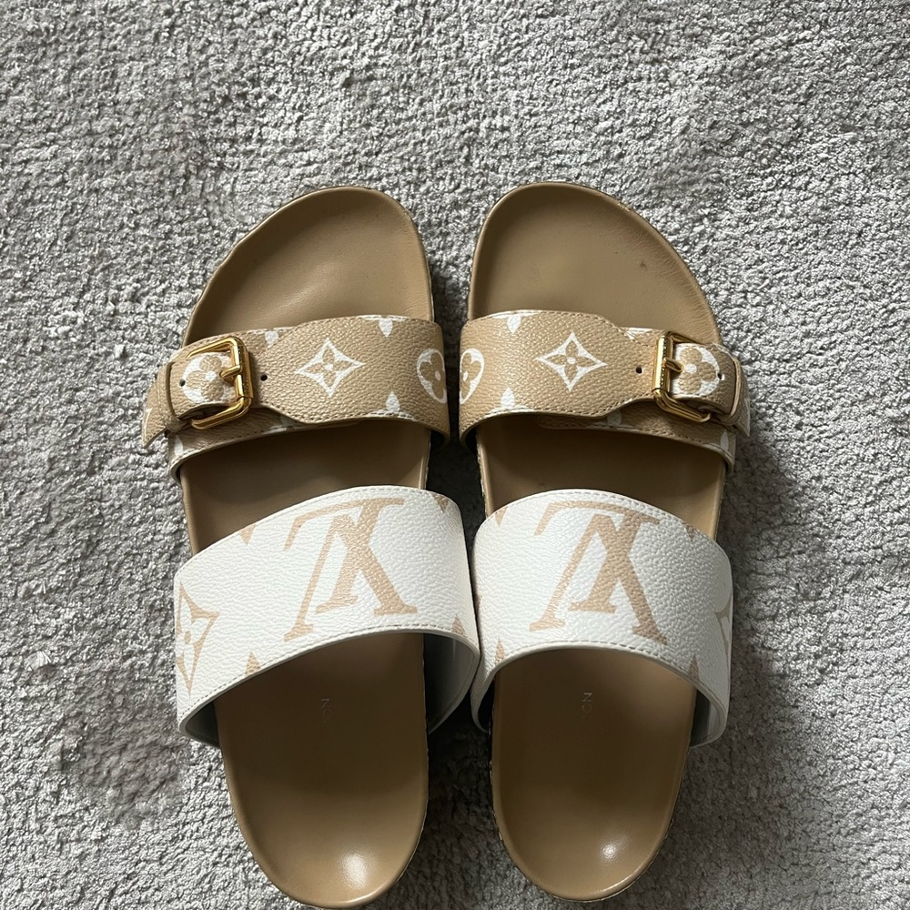 Louis Vuitton birkenstocks. Pre-worn. Size 37. Originally $900.